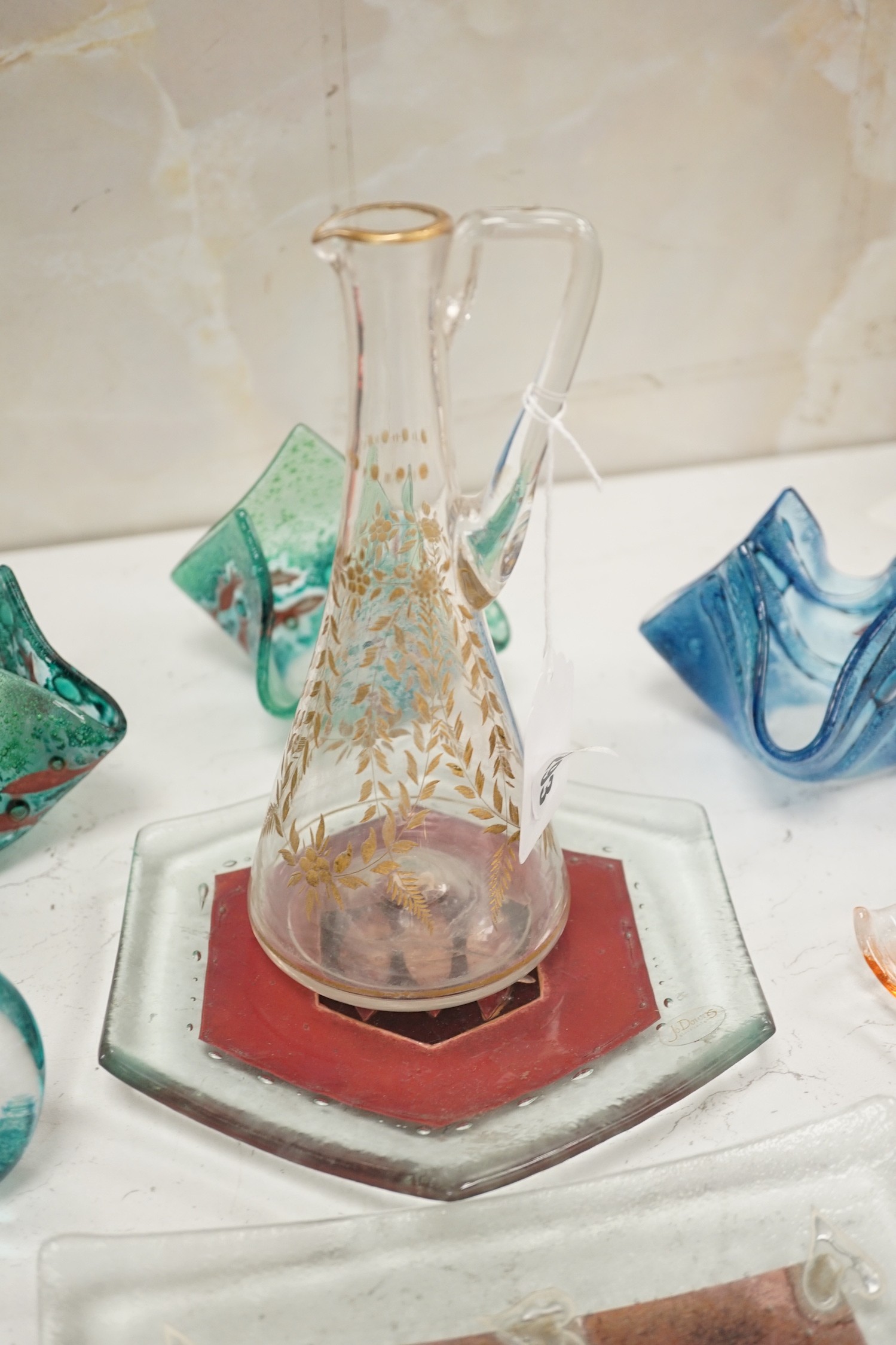 Three glass handkerchief vases and six other glass items